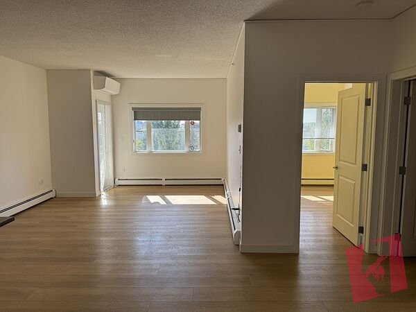 Modern Top-Floor Condo with South Facing Views!