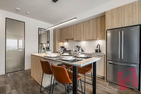Stylish fully furnished two bedroom, two bathroom condo is located in the sought-after neighbourhood of Kensington. photo 2