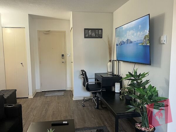 Prime location 1Bed+den Furnished condo