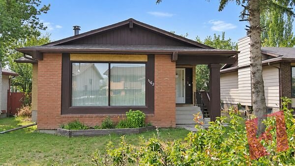 Bungalow Main Floor for Rent in Falconridge NE, Fireplace and Laundry