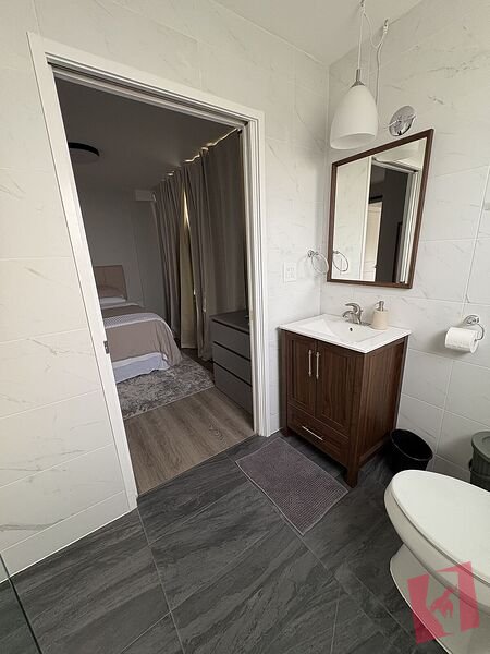 FURNISHED MAIN-FLOOR BEDROOM WITH PRIVATE ENSUITE photo 3