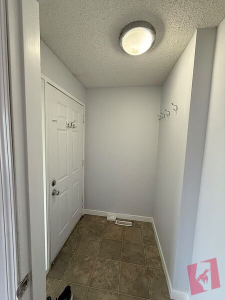 3 Bedroom Main Floor Suite in Falconridge NE | In Suite Laundry and Deck photo 3