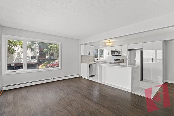 RENOVATED 900 SQFT OPEN CONCEPT CONDO IN BANKVIEW! UNDERGROUND PARKING!!!
