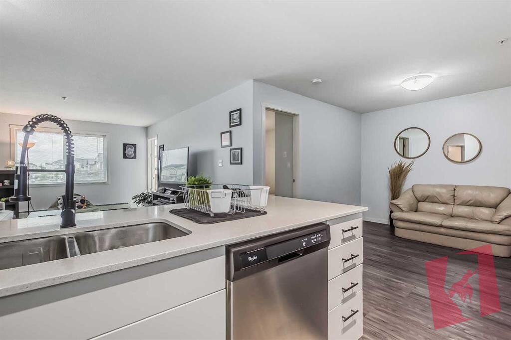Spacious 2 Bedroom, 1 Bath, + Den + Balcony in Skyview Ranch! photo 3