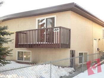 Renovated Corner Unit Available in Bilevel 4 Plex!!