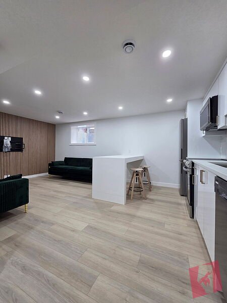 Brand New Legal 1 Bed + 1 Bath Bsmt Suite | Steps to C-Train | Semi-furnished