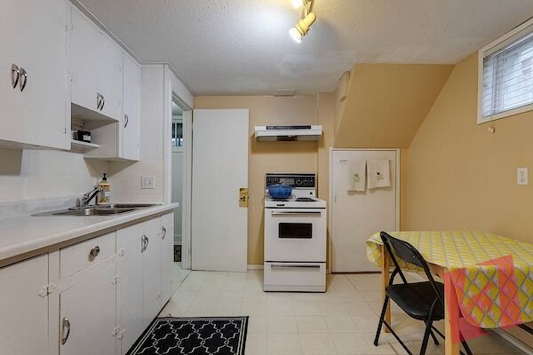 Large and private 1 BDRM Legal Basement Suite on tree lined street photo 2