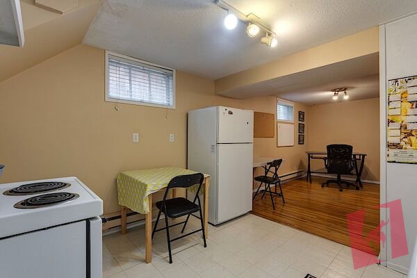 Large and private 1 BDRM Legal Basement Suite on tree lined street photo 3