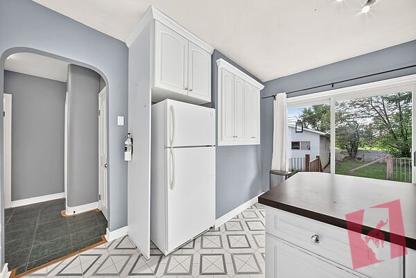 Spacious 2-Bed + 1 Bath Bungalow with Yard in Banff Trail