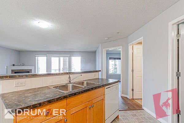 Marda Loop Gem | 2 Bed + Den, 2 Bath | Underground Parking + Utilities Included photo 3