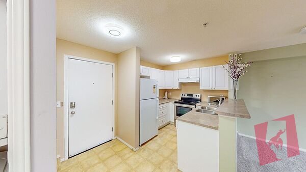 Cozy two-bedroom condo unit in Bridlewood! photo 2