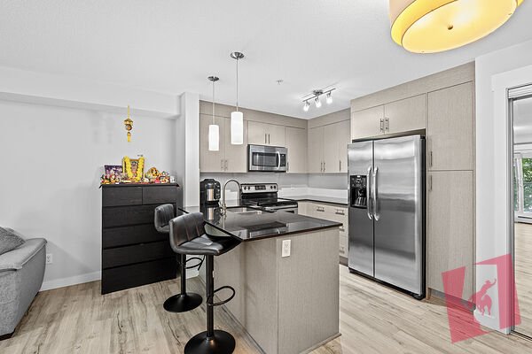 Spotless 2-Bed, 2-Bath Sky Mills Condo with Balcony & Heated Underground Parking photo 2