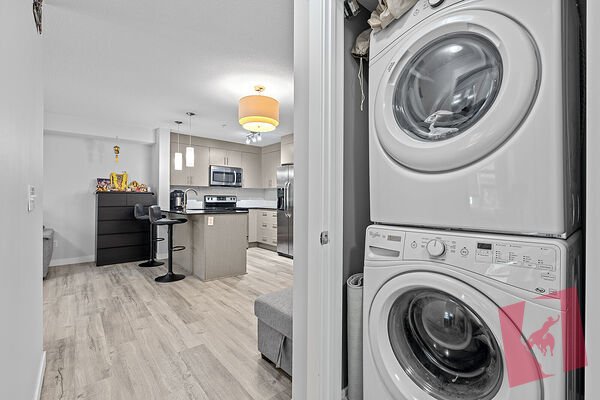 Spotless 2-Bed, 2-Bath Sky Mills Condo with Balcony & Heated Underground Parking photo 3