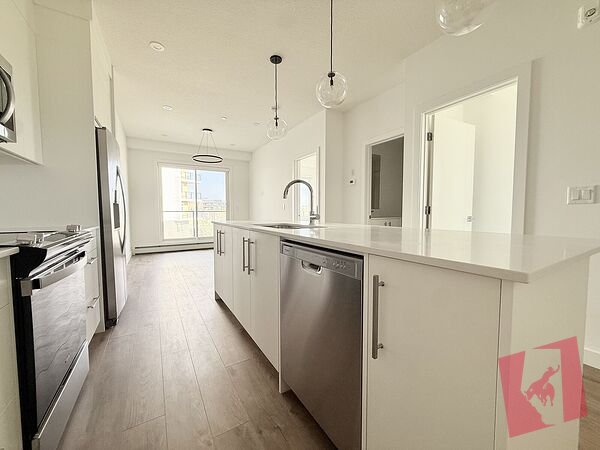 BRAND NEW CONDO IN WOLF WILLOW | MODERN FINISHES | PREMIUM AMENITIES photo 3
