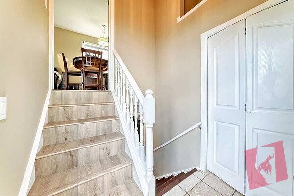 Fully Updated Bi-level For rent in Falconridge NE (2 separate units) photo 2