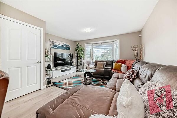 Fully Updated Bi-level For rent in Falconridge NE (2 separate units) photo 3