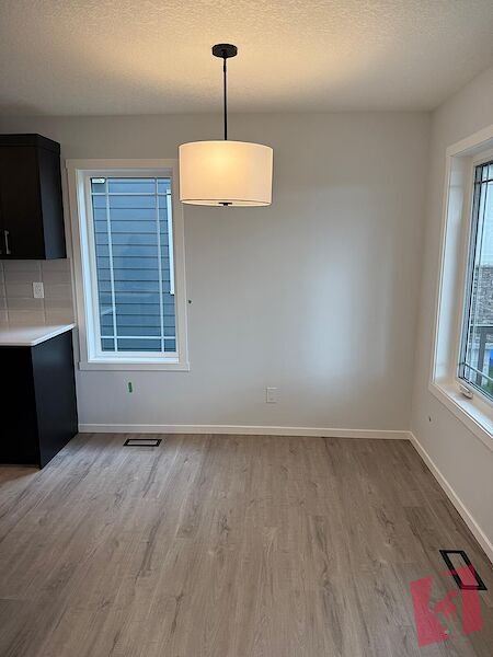New Three (3) Bedroom Townhouse with attached double garage photo 2