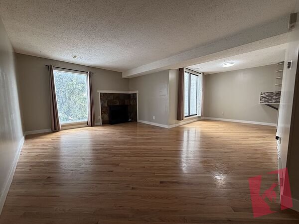 Spacious Varsity 2 Bed Condo | 1100 Sq Ft | Laundry | Parking