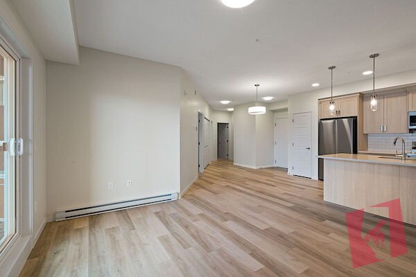 HARVEST HILLS- PINACCLE- ONE BEDROOM PLUS DEN photo 3