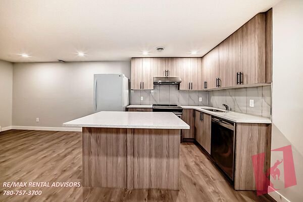 GREAT 1 BED, 1 BATH LEGAL BASEMENT SUITE WITH STREET PARKING IN THE COMMUNITY OF LIVINGSTON photo 2