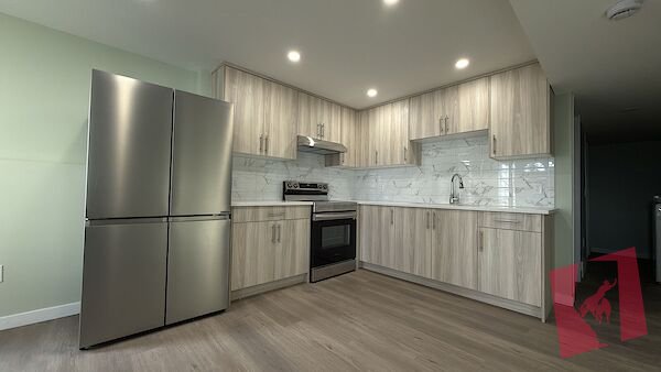 Brand New Walk-Out Legal Basement Suite | 2 Bed + Den | 1 Bath | photo 2
