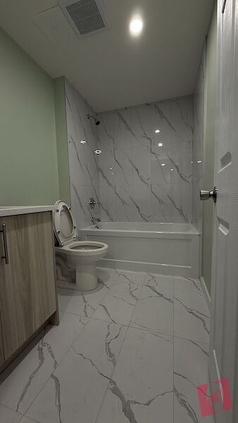 Brand New Walk-Out Legal Basement Suite | 2 Bed + Den | 1 Bath | photo 3