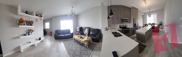 Modern and Convenient 3-Bedroom + Den, double garage townhome in Cornerstone! photo 2