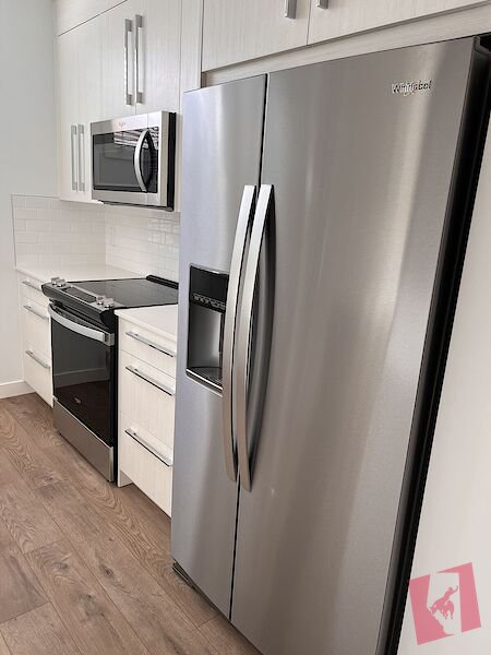 UTILITIES INCLUDED! Spacious Basement Suite in Rangeview photo 3