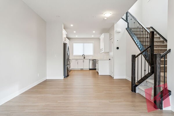Main Floor Legalized Unit in Modern Townhome in Sage Hill with Double Garage! photo 3