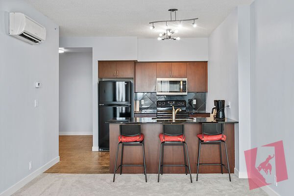 1 Bed + Den | 750+ Sq.Ft. | A/C | Steps to Heritage C-Train photo 2