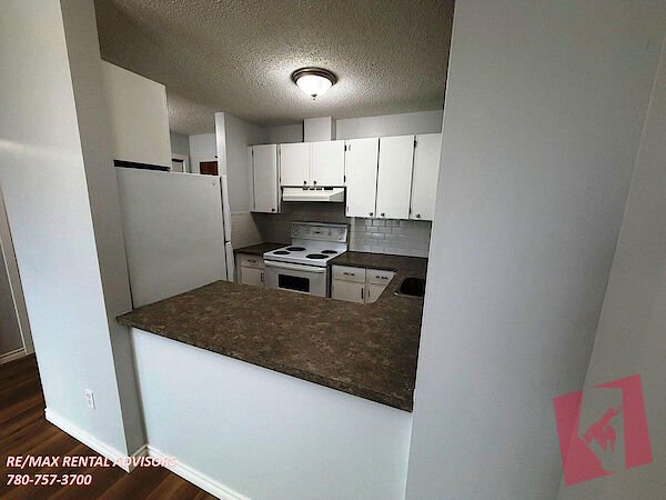 AMAZING 1-BED AND 1-BATH APARTMENT WITH ONE SURFACE STALL IN THE COMMUNITY OF GLAMORGAN photo 3