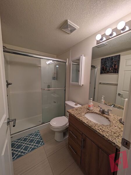 Spacious 2 Bed | 2 Bath Condo with 2 Parking Stalls, A/C & West-Facing Balcony photo 3