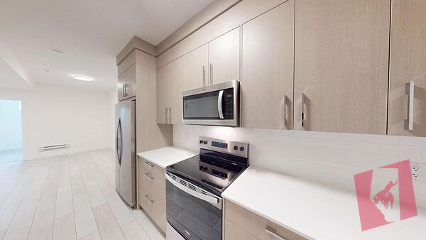 Beautifully Finished 1-bedroom, 1-bath basement suite in Huxley! photo 2