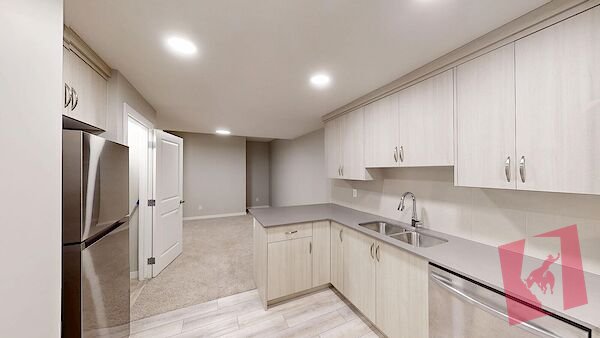 Cozy 2-bedroom, 1-bath legal basement suite in the vibrant new community of Rangeview! photo 2