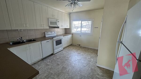 Large, bright main floor of duplex photo 2