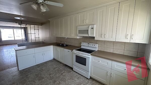 Large, bright main floor of duplex photo 3