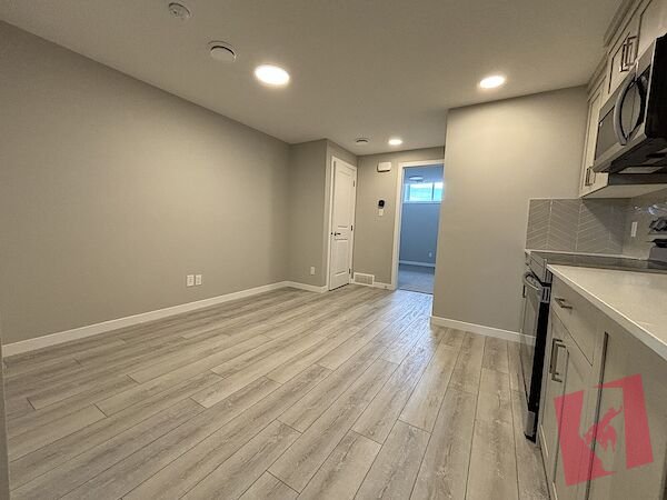 Built 2-Bedroom, 1-Bathroom Legal Basement Suite in Creekstone SW photo 3