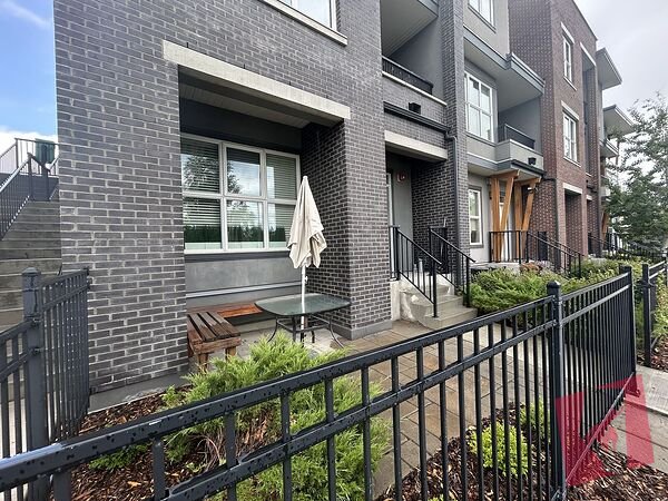 South-facing private fenced patio / walking distance to Mount Royal University!