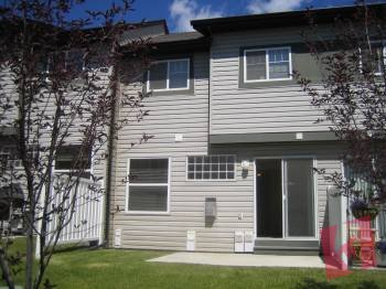 This 3 bedroom plus townhome is located in a family-friendly community Everstone photo 2