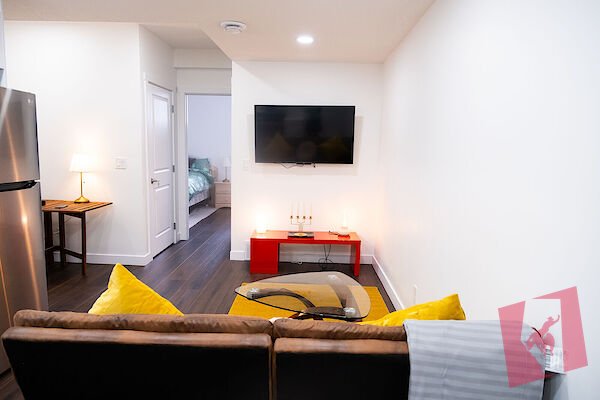 FURNISHED Family-friendly BRIGHT NEW 1 BEDROOM WALK-OUT BASEMENT SUITE
