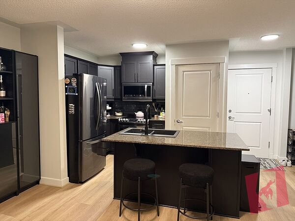 1 Bedroom + Den Condo in Marda Loop | Parking + Utilities Included