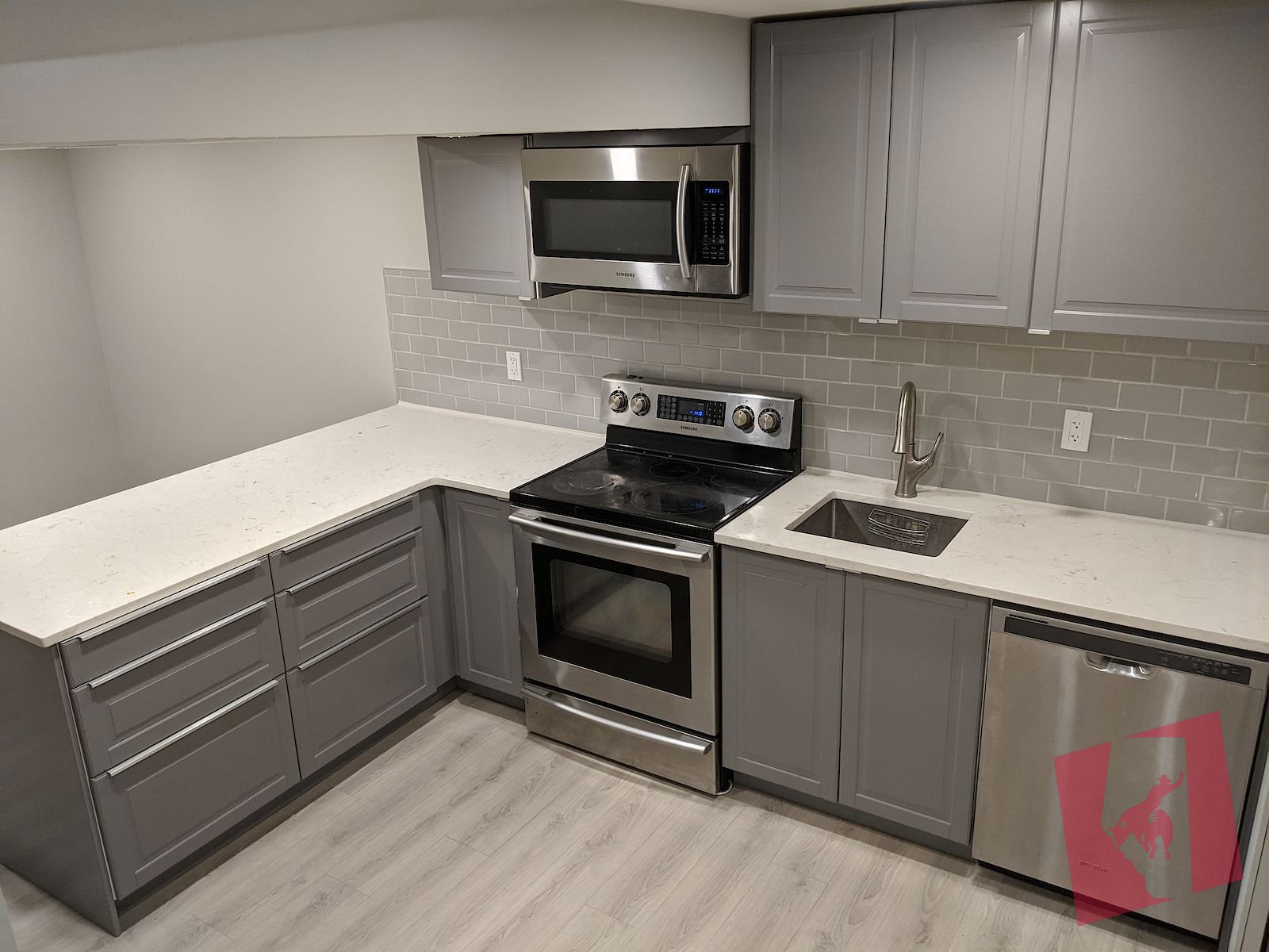 Basement suite w/ detached double wide garage for rent on Queensland drive photo 3