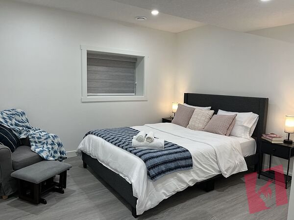 Modern 2-Bedroom Legal Basement Suite in Rocky Ridge NW – Utilities Included photo 2