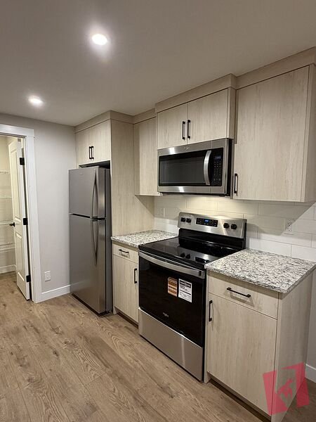 NEWLY BUILT LEGAL BASEMENT photo 2