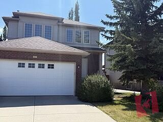 Spacious 3-Bed Home with Main Floor Den & Finished Basement in Wentworth SW